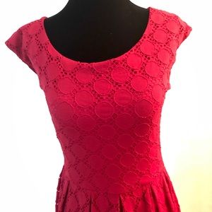 Adorable red dress with embossed circle and lace